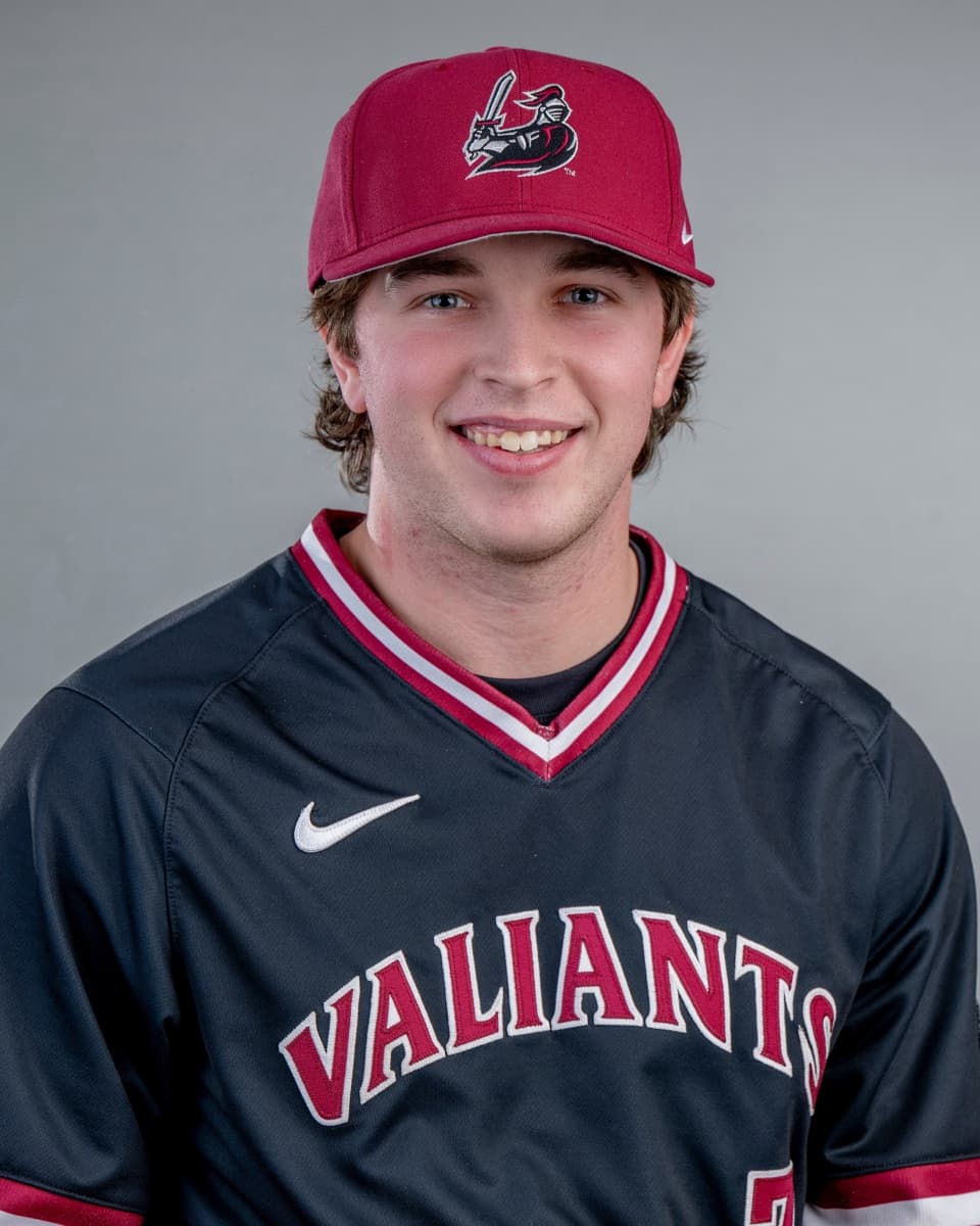 Anthony Iazzetti, owner of A-1 Exterior Services, smiling in his baseball uniform